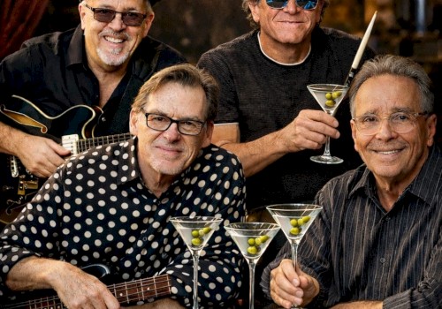 A band called Midnight Martini's performs smooth jazz and light rock at Vero Beach, FL, with four men enjoying drinks, music, and camaraderie.