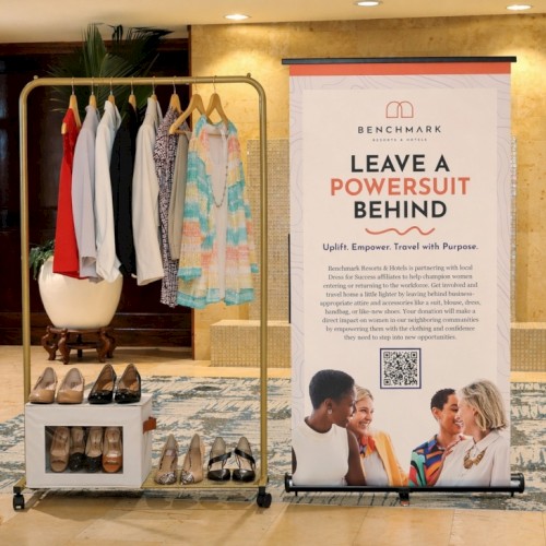 The image promotes empowering women to leave behind materialism and embrace purpose, with a clothing and shoe display nearby.