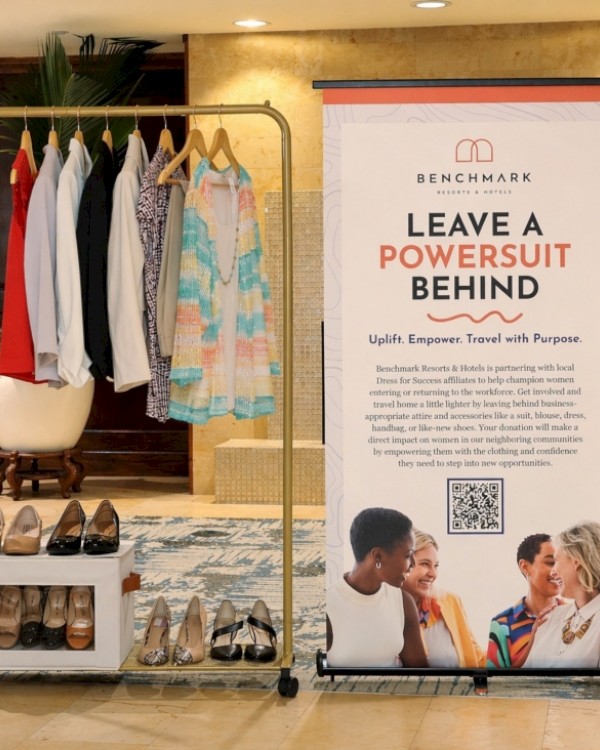 The image promotes empowering women to leave behind materialism and embrace purpose, with a clothing and shoe display nearby.