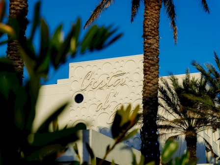 The image features a building facade with 